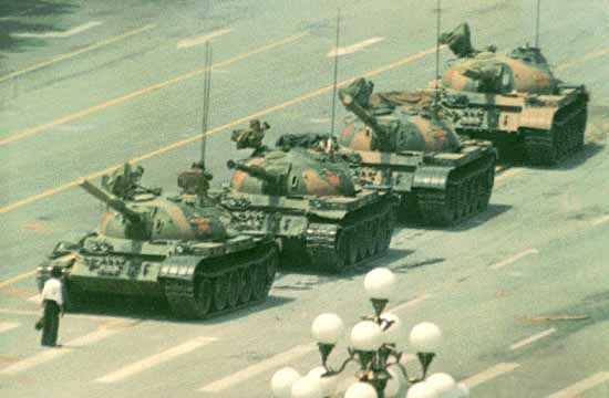 A young girl stops a tank in its tracks